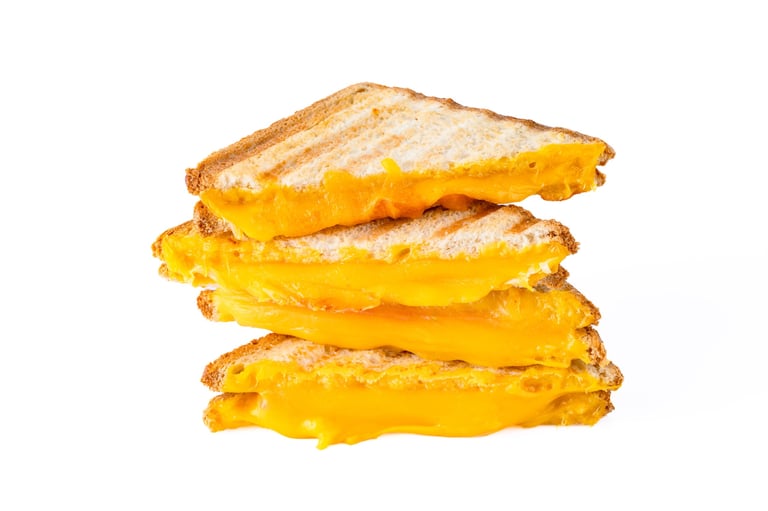 Classic grilled cheese on white background